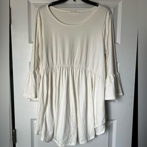 Super cute and flowy, white, half sleeve shirt.